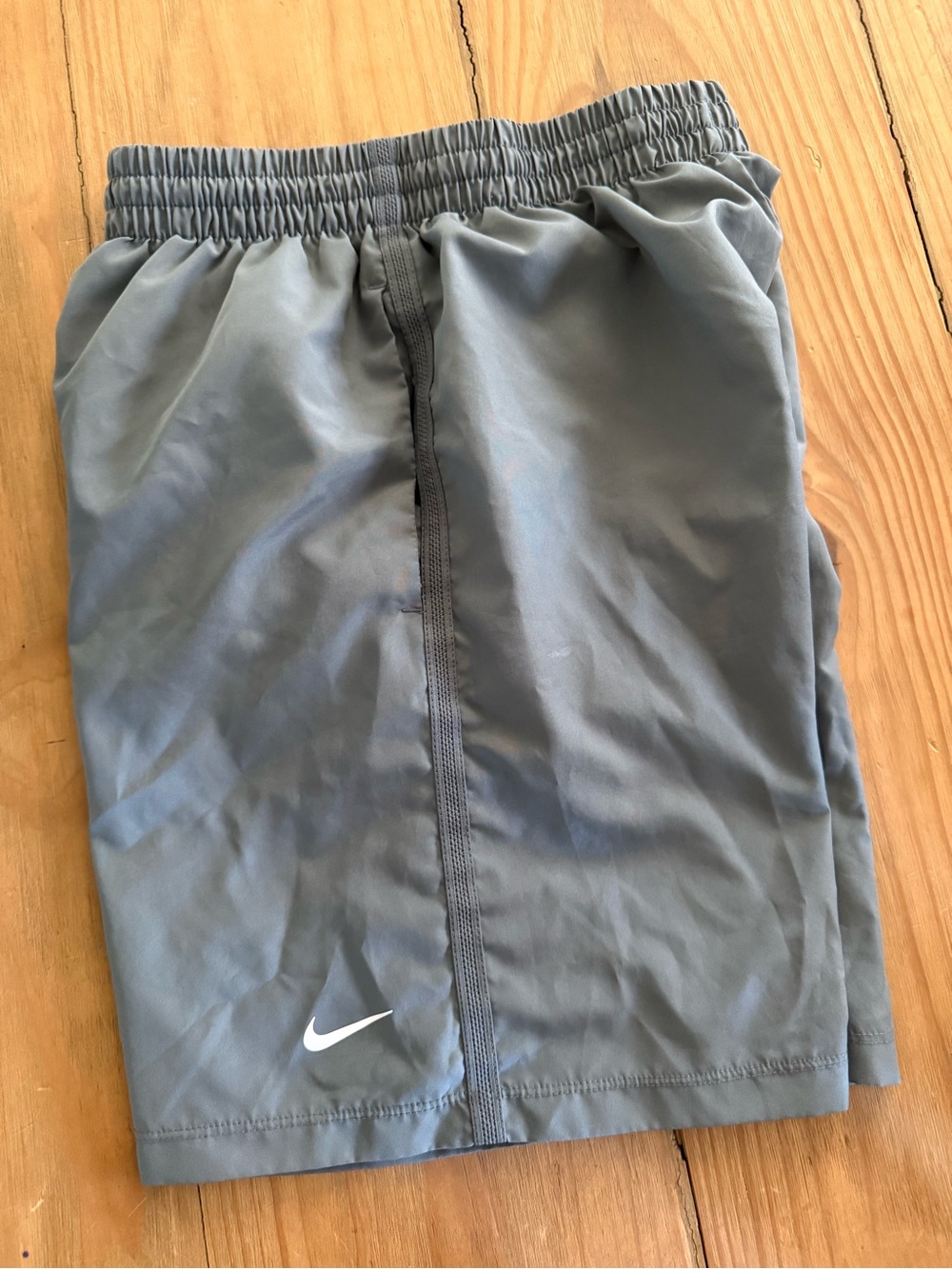 Nike Light Gray Athletic Shorts with White Swoosh